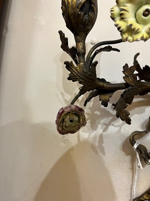 Lot 209 - A pair of Louis XV-style ormolu and porcelain wall lights