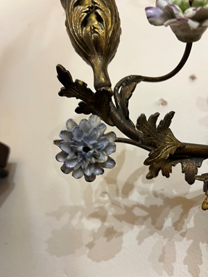 Lot 209 - A pair of Louis XV-style ormolu and porcelain wall lights