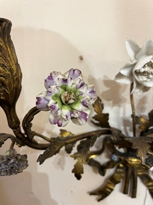 Lot 209 - A pair of Louis XV-style ormolu and porcelain wall lights