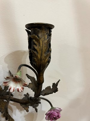 Lot 209 - A pair of Louis XV-style ormolu and porcelain wall lights