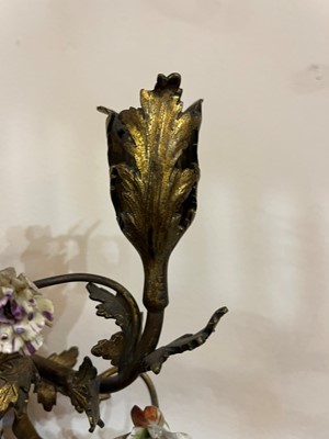 Lot 209 - A pair of Louis XV-style ormolu and porcelain wall lights