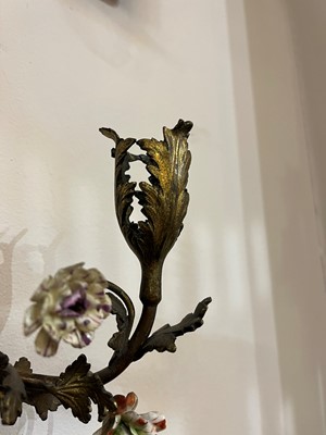 Lot 209 - A pair of Louis XV-style ormolu and porcelain wall lights