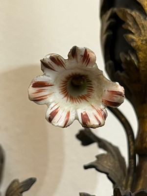 Lot 209 - A pair of Louis XV-style ormolu and porcelain wall lights