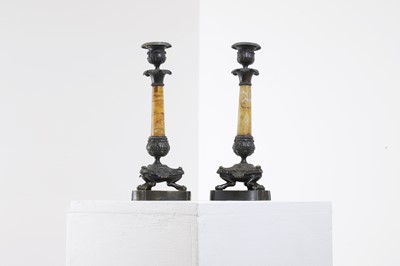 Lot 96 - A pair of Empire bronze and Siena marble candlesticks