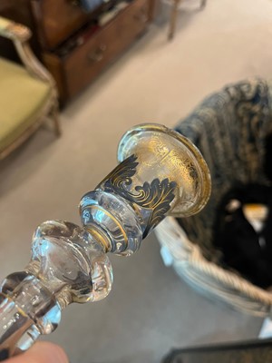 Lot 323 - A pair of enamel and parcel-gilt glass candlesticks
