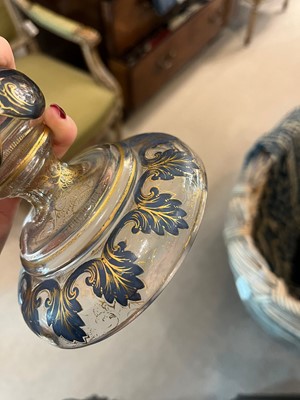 Lot 323 - A pair of enamel and parcel-gilt glass candlesticks