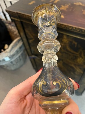 Lot 323 - A pair of enamel and parcel-gilt glass candlesticks