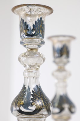 Lot 323 - A pair of enamel and parcel-gilt glass candlesticks