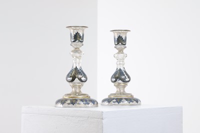 Lot 323 - A pair of enamel and parcel-gilt glass candlesticks