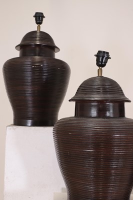 Lot 484 - A set of four glazed pottery table lamp bases