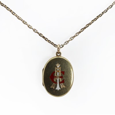 Lot 1411 - A gold champlevé enamel locket