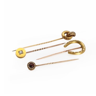 Lot 1294 - A group of gold stick pins