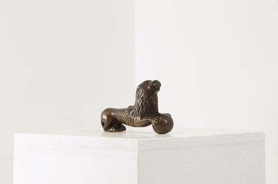 Lot 603 - A bronze door knocker