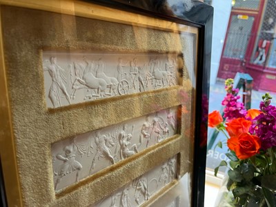 Lot 165 - A pair of plaster relief panel displays of the Parthenon frieze