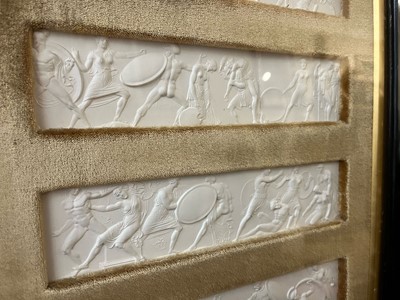 Lot 165 - A pair of plaster relief panel displays of the Parthenon frieze