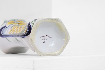 Lot 118 - A delftware tin-glazed earthenware garniture