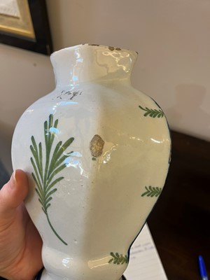 Lot 118 - A delftware tin-glazed earthenware garniture