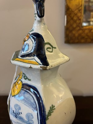 Lot 118 - A delftware tin-glazed earthenware garniture