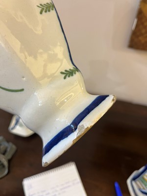 Lot 118 - A delftware tin-glazed earthenware garniture