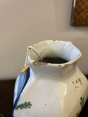 Lot 118 - A delftware tin-glazed earthenware garniture