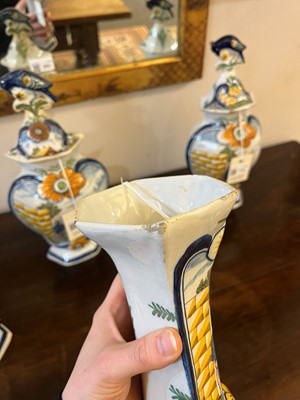 Lot 118 - A delftware tin-glazed earthenware garniture