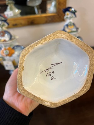 Lot 118 - A delftware tin-glazed earthenware garniture