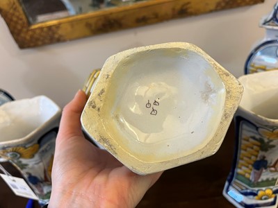 Lot 118 - A delftware tin-glazed earthenware garniture