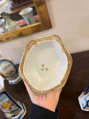 Lot 118 - A delftware tin-glazed earthenware garniture