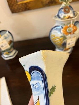 Lot 118 - A delftware tin-glazed earthenware garniture