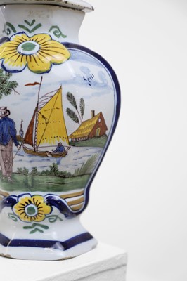 Lot 118 - A delftware tin-glazed earthenware garniture