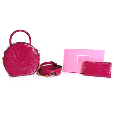 Lot 1476 - A Kate Spade berry blitz crocodile embossed circular bag