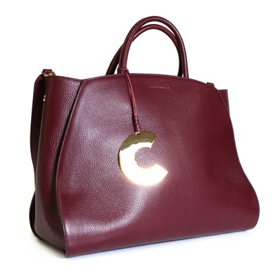 Lot 1512 - A Coccinelle plum leather shopper tote