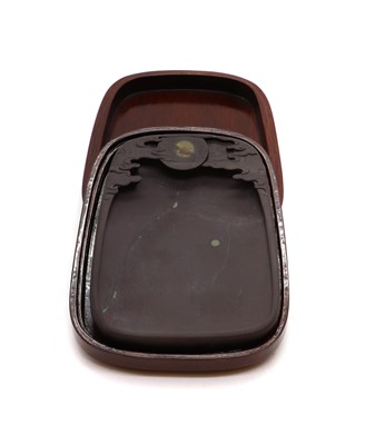 Lot 225 - A carved ink stone