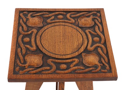Lot 407 - An oak torchere or side table