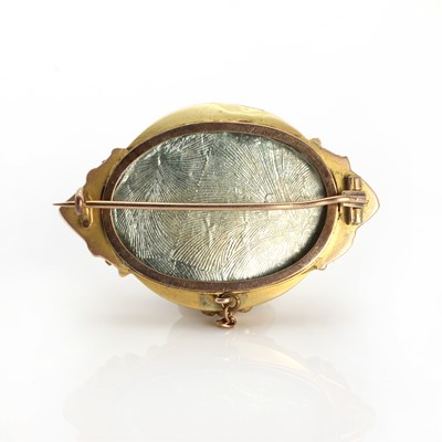 Lot 1013 - A Victorian garnet set shield form brooch of navette shape c.1890