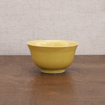 Lot 65 - A Chinese yellow-glazed bowl