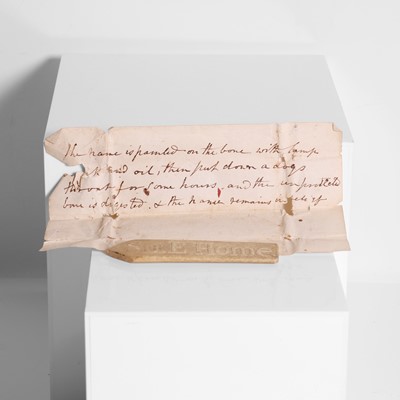 Lot 230 - A 'dog's stomach' etched bone