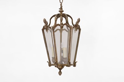 Lot 141 - A pair of Louis XV-style silvered-brass lanterns