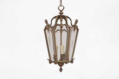 Lot 141 - A pair of Louis XV-style silvered-brass lanterns