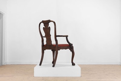 Lot 142 - A large George II-style oak armchair