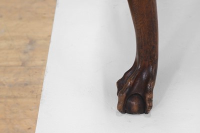 Lot 142 - A large George II-style oak armchair