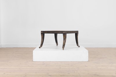 Lot 133 - An Empire-style ebonised and parcel-gilt wooden stool