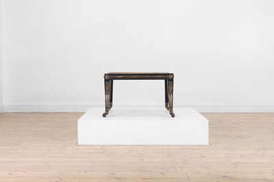 Lot 133 - An Empire-style ebonised and parcel-gilt wooden stool