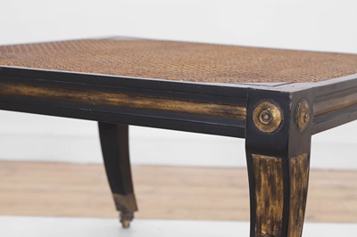 Lot 133 - An Empire-style ebonised and parcel-gilt wooden stool