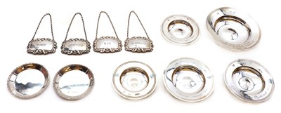 Lot 28 - A pair of silver coasters
