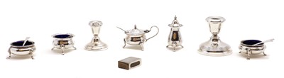 Lot 21 - Two silver dwarf candlesticks