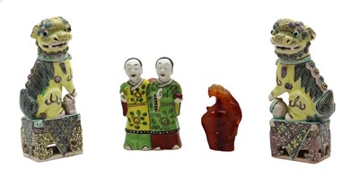 Lot 125 - A pair of Chinese Dogs of Fo