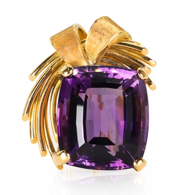 Lot 88 - A large cushion cut amethyst brooch, c.1950