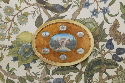 Lot 327 - An oval miniature display
