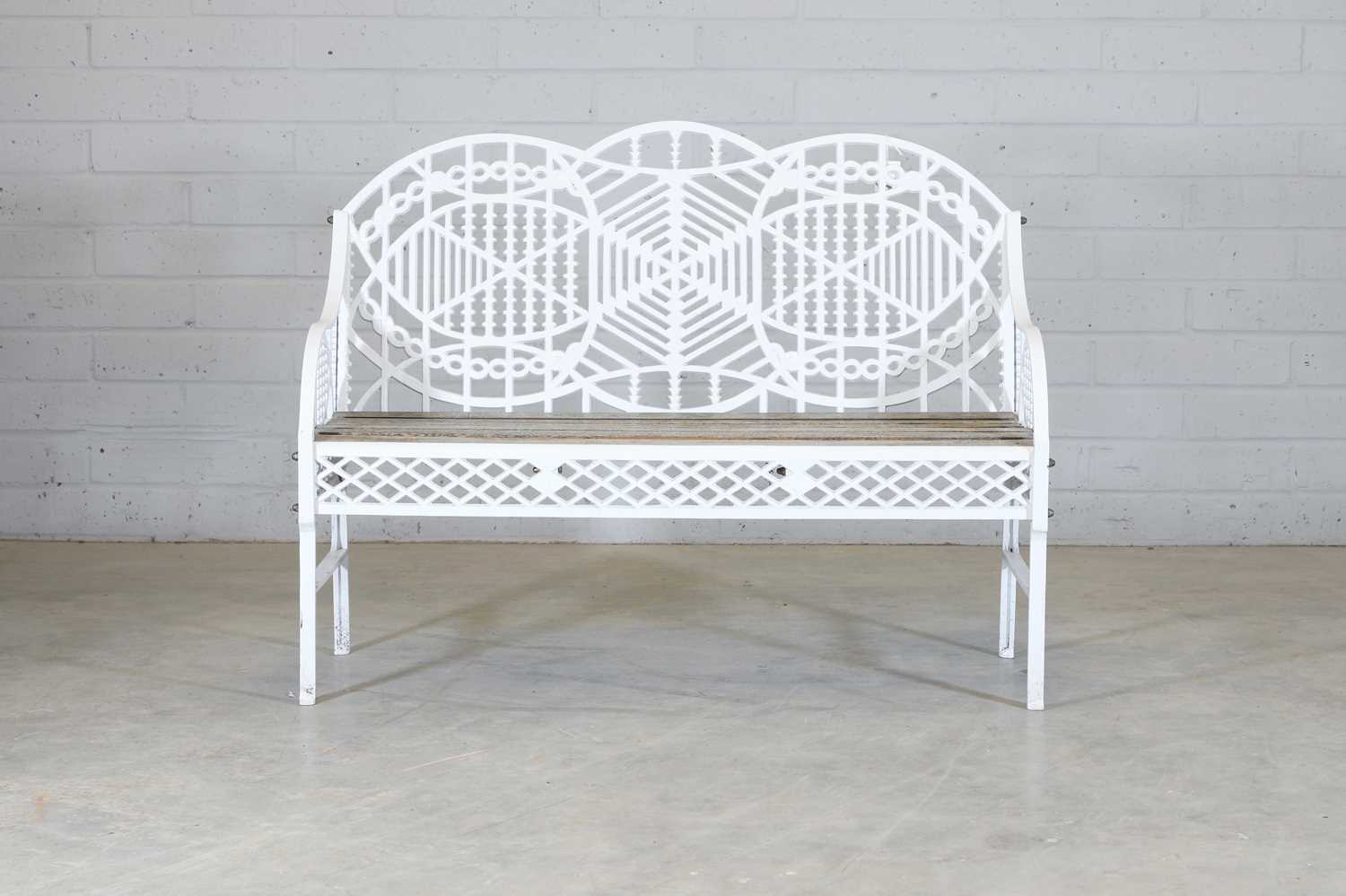 Lot 180 - A cast iron garden bench